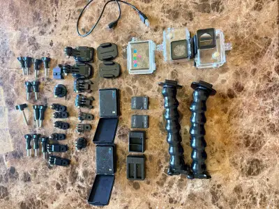 Selling a massive bundle of GoPro-compatible accessories, mounts, and power gear. This is perfect if...