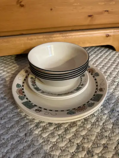 This Corelle dish set features a delightful bee and floral design, perfect for adding a touch of whi...