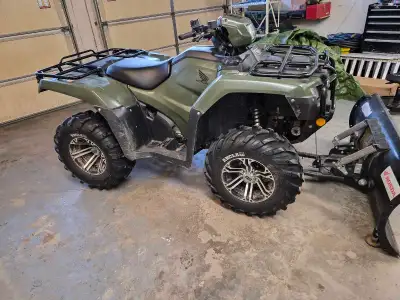 Here I've got the perfect quad for trail riding, farm work, pushing snow in the winter or just work...