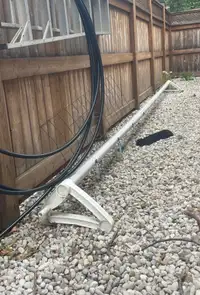 Pool roller and stand