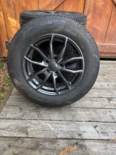 Michelin X-Ice winter tires - latitude. Size 215-65R16 Mounted on RW polished black $900.00 OBO