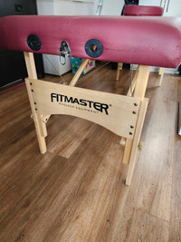 Red Fitmaster massage table