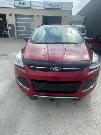 2015 Ford Escape SE 4WD sport utility Beautiful fully loaded car like new condition only hail claim...