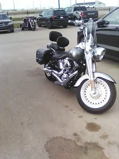2009 Fatboy with 26K. It’s a beautiful bike with the extras for a road trip or stripped down for a c...