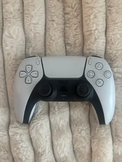PS5 DualSense controller in like new condition. Barely used and works perfectly with no issues. Boug...