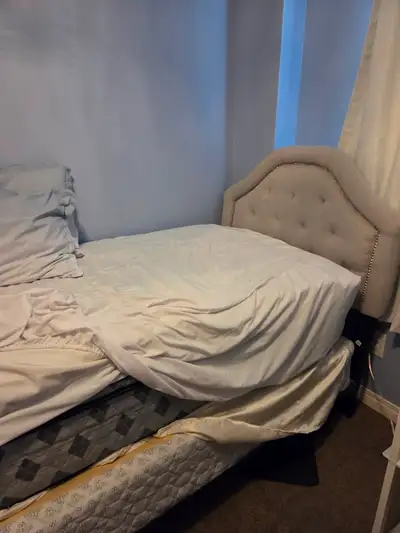 Twin bed and headboard for sale., View more
