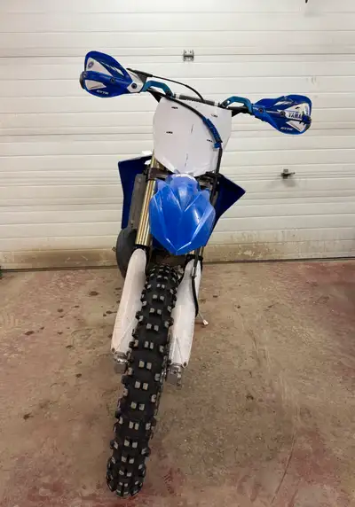 Up for sale is a Yamaha YZ250X, a high-performance two-stroke dirt bike designed for off-road advent...