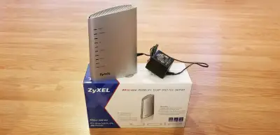 Zyxel ADSL2 modem + VoIP adapter, View more