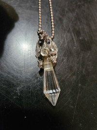 Wizard with crystal necklace