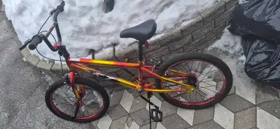 Nevelo boys bike used for a season. Brake pads will need to be replaced soon