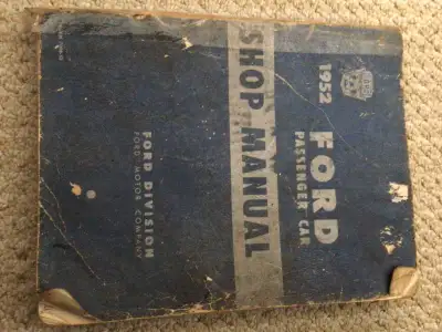 heavy shot manual for a 1952 Ford passenger car it’s in fair shape the binding is pretty bad but all...