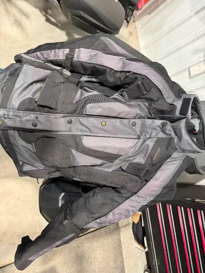 I have an Olympia jacket for sale. Size XL. They fit on the small side. I would say it fits like a l...