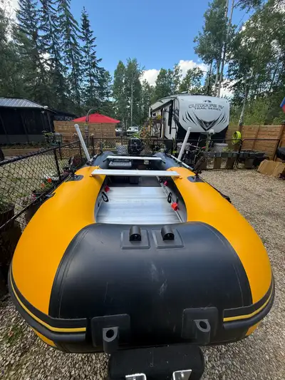 Bought new 2022. Aquamarine. Comes with 20 hp Tahatsu with one year warranty left. Aluminum flooring...