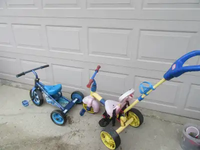 2 SMALL TRICYCLES, View more
