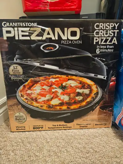 Enjoy delicious stone-baked pizza at home with the Piezano Electric Pizza Oven. This brand new, neve...