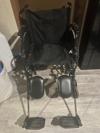 Wheelchair with elevating leg lifts - gently used 