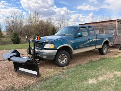 2000 F150 7700 with a Snoway 6 way plow. Just put $2500 into the plow to replace all the electrics a...