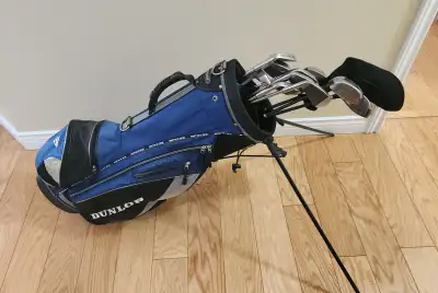 Golf bag and clubs, View more
