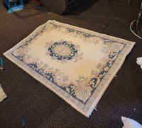 58 1/2 by 38 1/2 inch area rug 