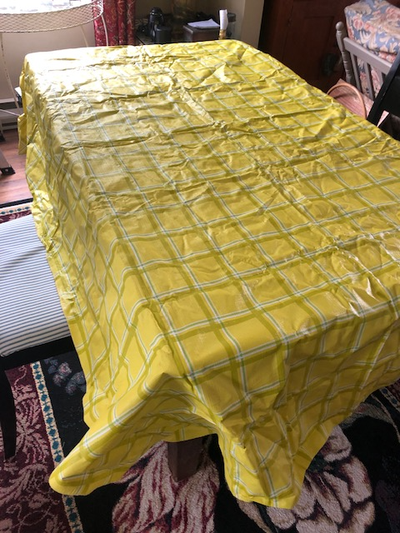 YELLOW AND WHITE PLAID PLASTIC TABLECLOTH, View more