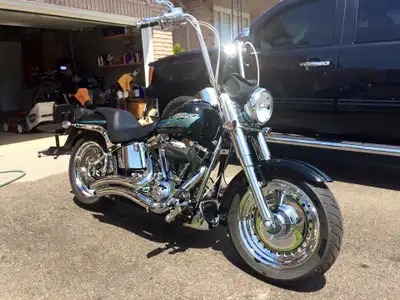 One owner, very well maintained with many upgrades. Chrome all around, computer, Saddleman seat, wit...