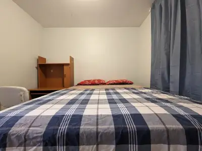 This private room features a comfortable queen size bed and includes access to a shared washroom, pe...