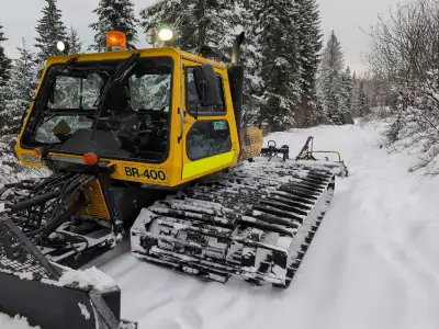 Bombardier BR400 with tiller and track setters cable drive. Used on nordic ski trails for last 15 ye...
