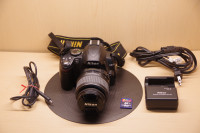 Nikon D3000 camera with an AF-S DX 18-55mm lens