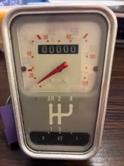 This is a vintage French speedometer, from a classic European car- The Citroen 2CV It shows 00000 km...