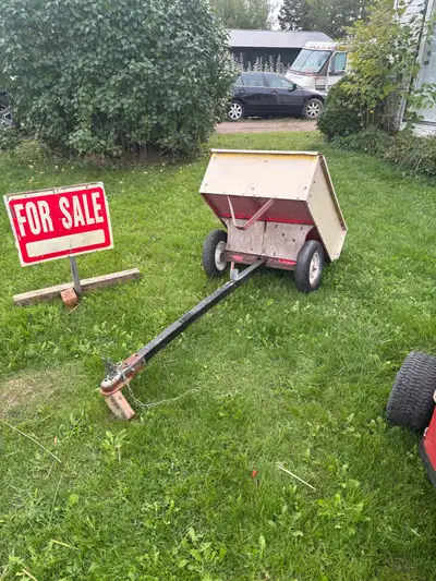 Small ATV Dump Trailor for ATV or riding mower perfect for yard clean up or hauling wood. Asking $17...