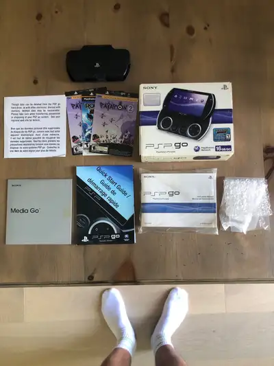 Sony PSP GO Box packaging and case, View more