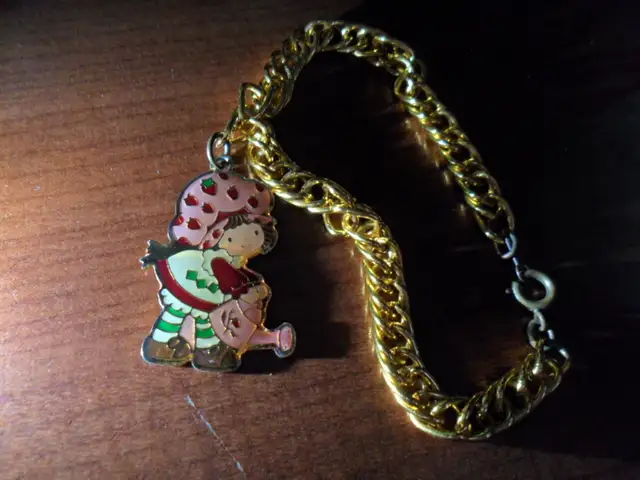 Vintage Strawberry Shortcake Ring and Bracelet. $30 for both.  C63735875854337121
