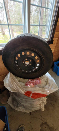 P195/65R15 - a set of all-season tires with rims