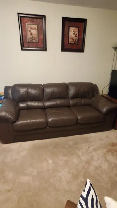 Brown leather couch and loveseat., View more