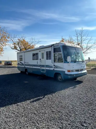 Nice Coach. All appliances and generator, air conditioner work. Nice layout with walk through bath w...