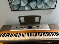 Yamaha electric piano DGX630 with LP7A 3 pedals.