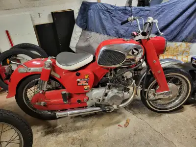 1967 305cc touring Honda Dream. She's a beauty, some aftermarket parts. Runs, stops and drives like...