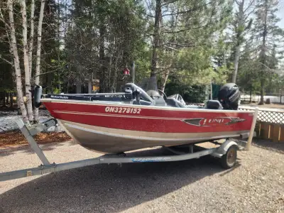 Ultimate fishing boat, includes electric trolling motor and galvanized trailer. This thing is fast t...