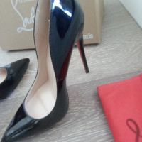 CHRISTIAN LOUBOUTIN 37.5 