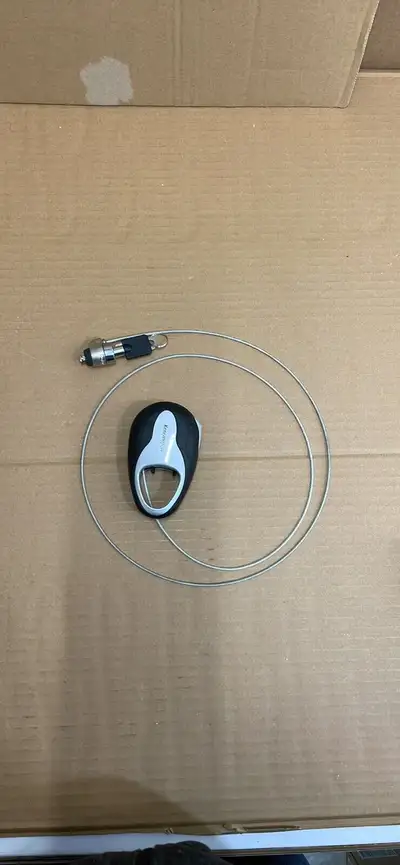 Kensington laptop lock with key and retractable steel cable, View more