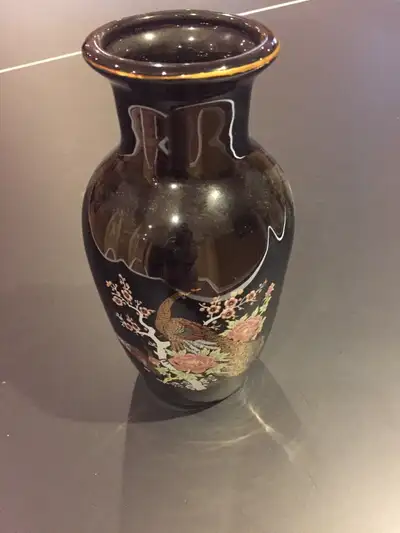 Black colour. 20 cm tall
