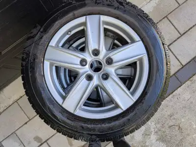 Four (4) 18" Porsche Cayenne S III OEM wheels with old winter tires. Tires good for light summer use...
