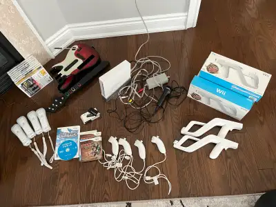 Nintendo Wii System and Bundle 12 Games Guns Adapter+++ $500 OBO, View more
