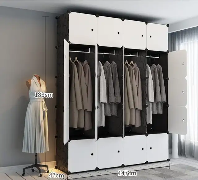 Versatile modular wardrobe with a black and white color scheme. in Dressers & Wardrobes in Mississauga / Peel Region - Image 2