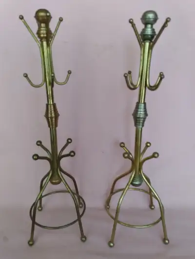 A pair of nice, vintage solid brass coat hangers for your keys and jewelry. They are both in perfect...