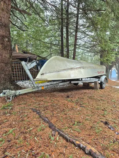 Mint Lund fishing boat. 12' with EZ loader trailer (lights and tires are good) and Merc 9.9. Boat co...