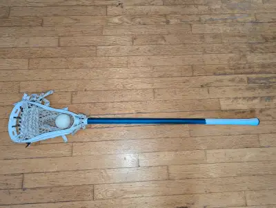 Lacrosse stick.metal shaft#15..measures 42" long.made in Canada .brine edge stick.used.