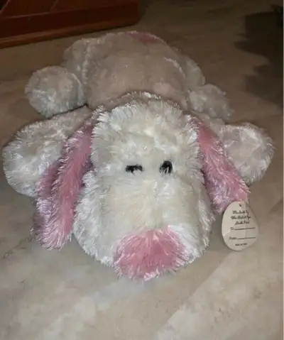 Dog stuffed animal In great condition has tag attached on ear White and pink in color Medium in size...
