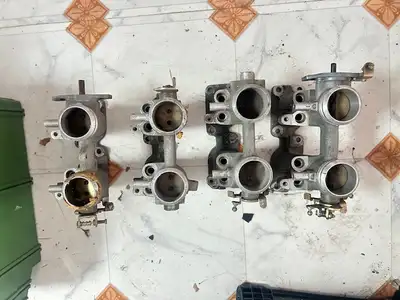 Throttle bodies for Ferrari F40, original, used in good condition. Price on request. More parts avai...