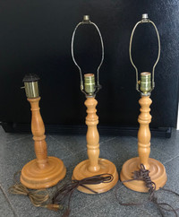 Lot of three lamps .  Wooden base.  